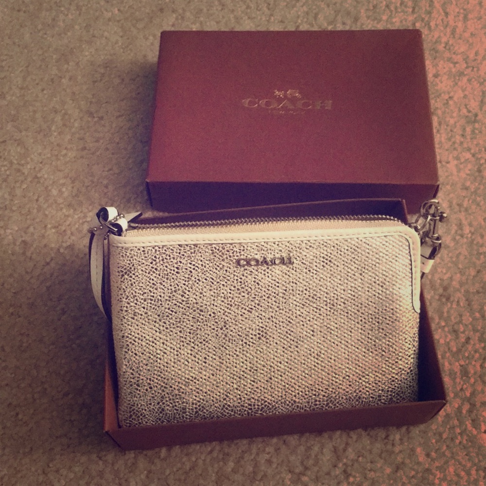 Coach white metallic wristlet